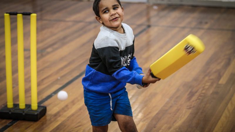 PCYC Moree kid hitting ball with bat