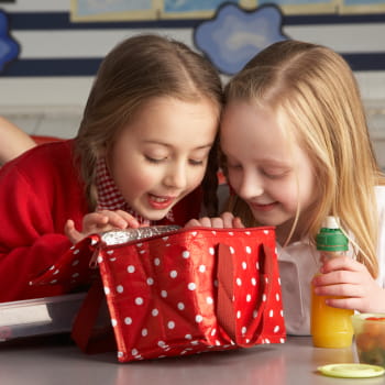 girls sharing lunch