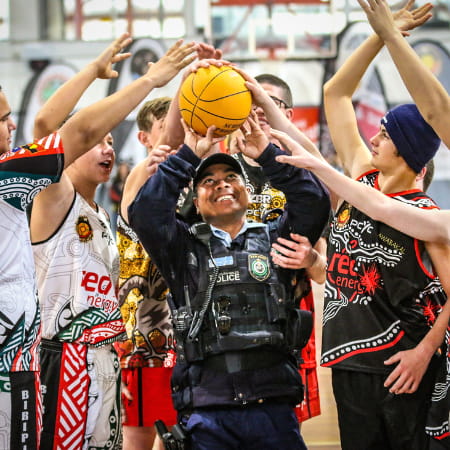 policer officer tries to shoot a ball